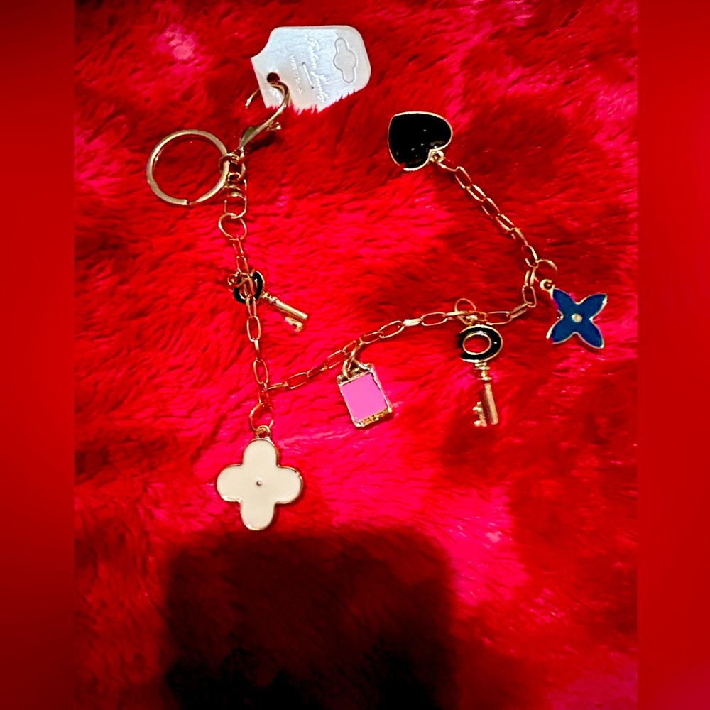 Absolutely gorgeous purse charm or keychain  bling gold brand new